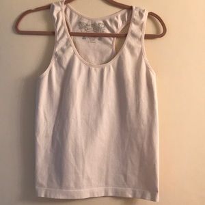 White scoop neck ribbed tank with cut shoulders